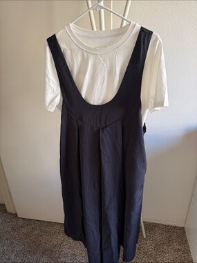 Black Pinafore Dress over White Tee
